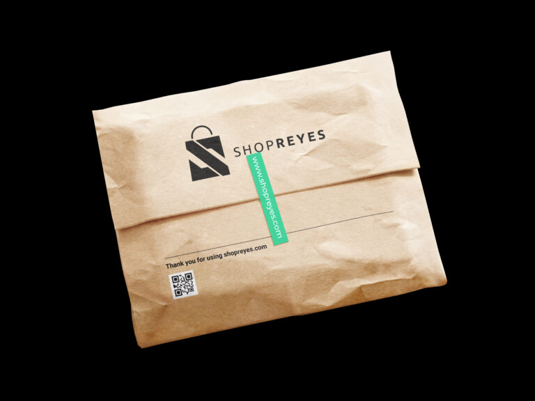 ShopReyes logo design on postal package mockup by RW graphic designer